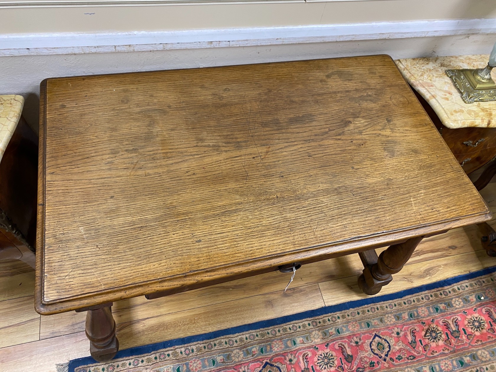 An early 20th century oak side table, width 100cm, depth 58cm, height 75cm